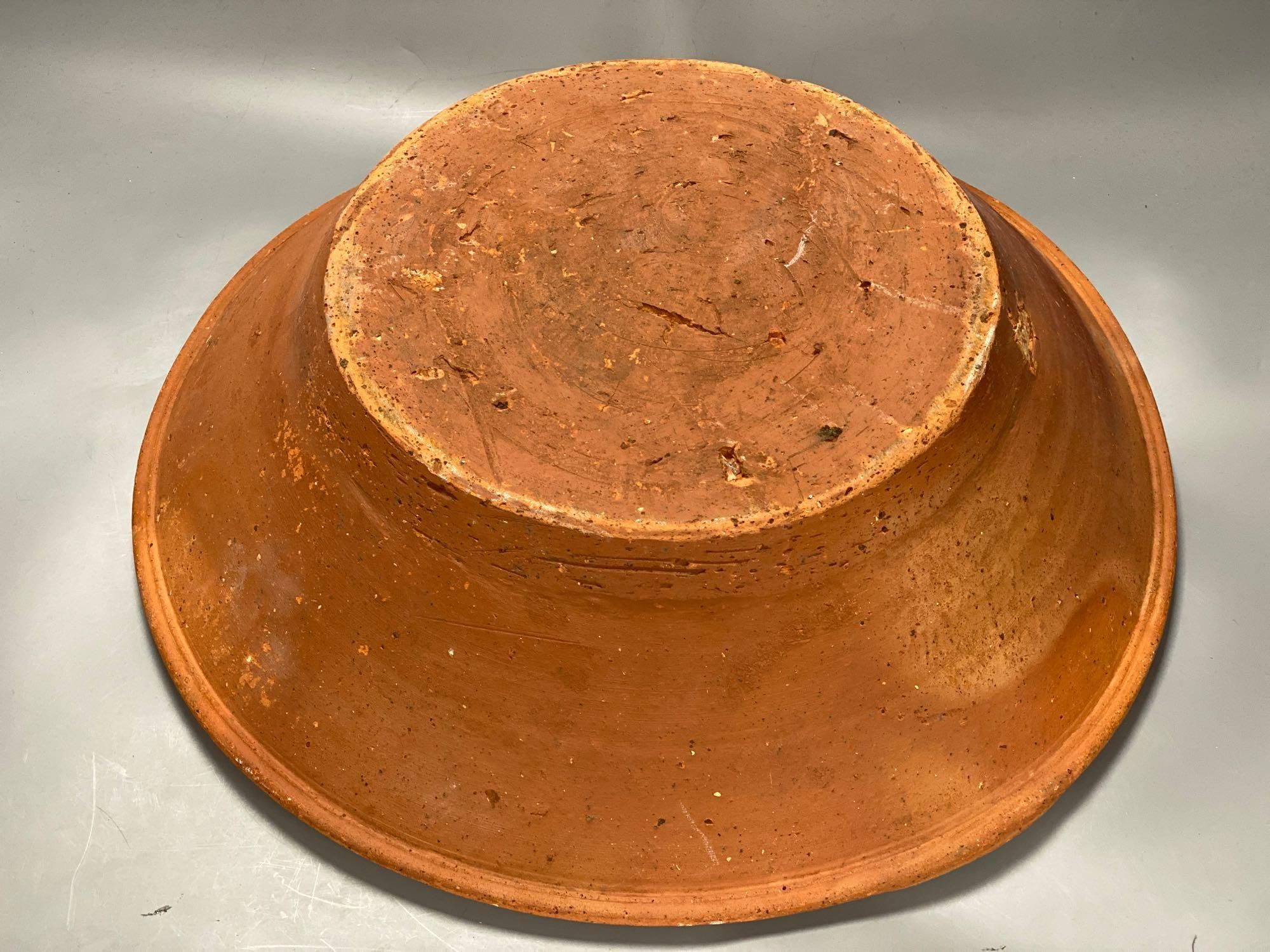 A 19th century Sussex terracotta basin